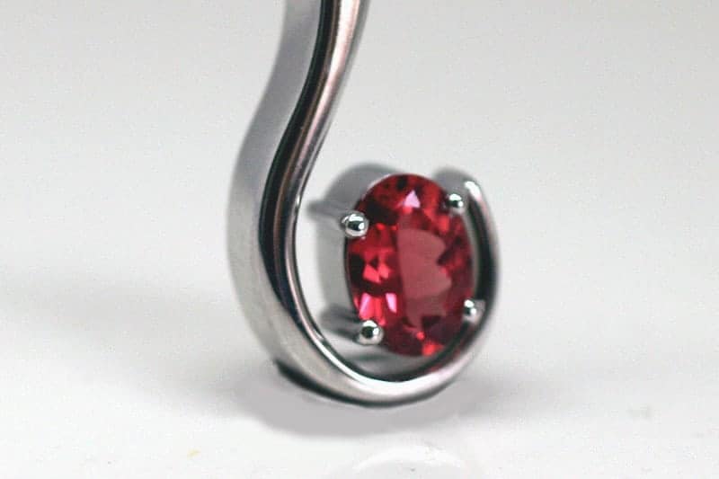 40th anniversary pendant featuring a gorgeous Fair Trade ruby in recycled 18 carat white gold.