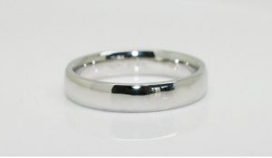 Ring image: Handmade wedding ring. With a simple design, this wedding ring features a polished finish and a half-round design.