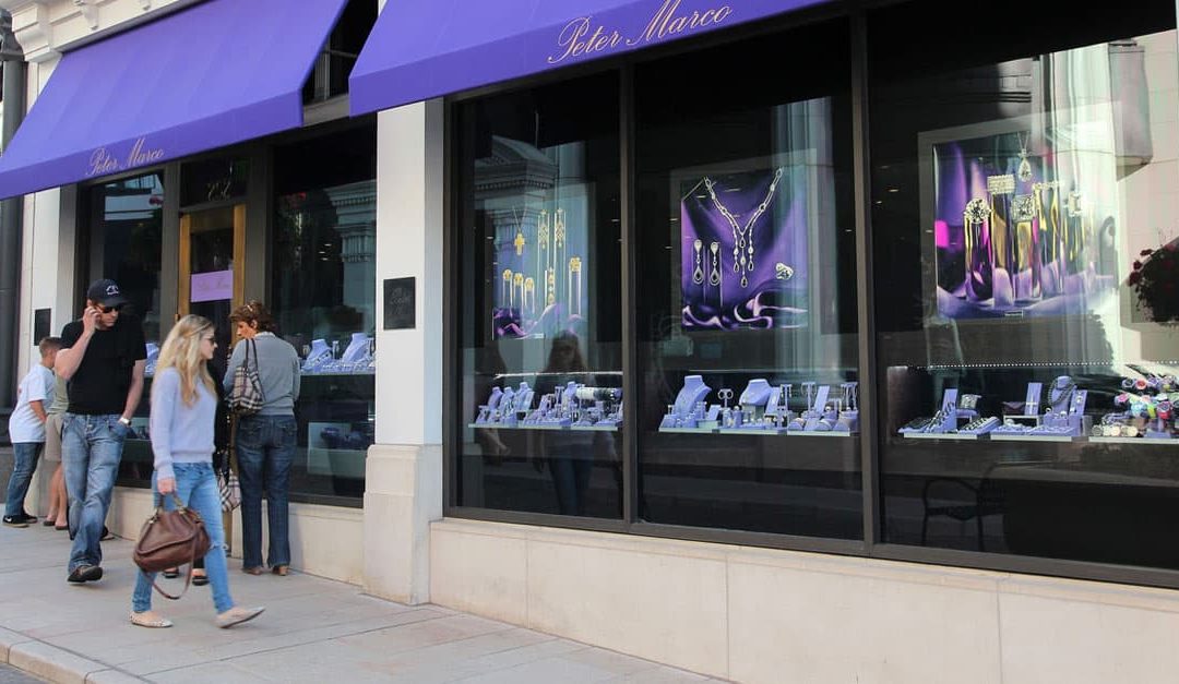 Photo of a typical jewellery store window featuring large numbers of diamonds on display