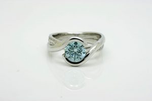 Blue lab-grown diamond embrace ring with Argyle accent diamonds - by Ethical Jewellery Australia