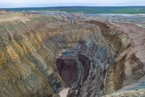 Massive open cut diamond mining pit in the town of Aykhal, Yakutia, Russia. ALROSA.