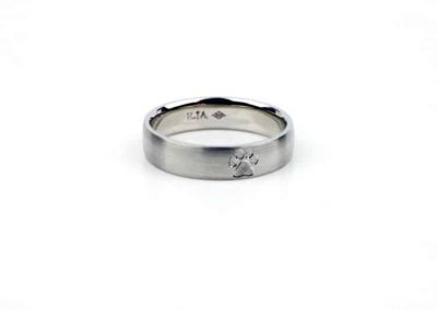 Platinum Wedding Ring with Paw Print Engraving