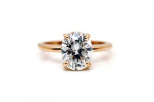 Handmade 18 carat rose gold solitaire engagement ring featuring an oval cut moissanite - by Ethical Jewellery Australia